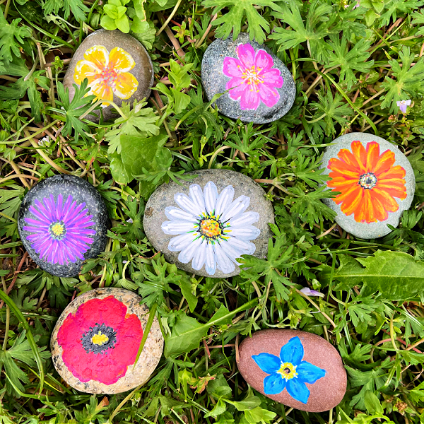 Floral painted rock plant markers